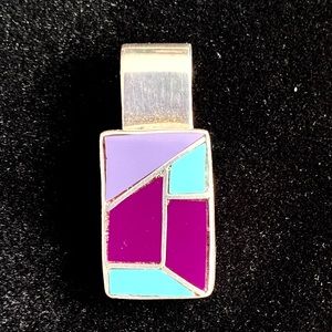 Silver pendant with turquoise and purple. 1 3/4”.